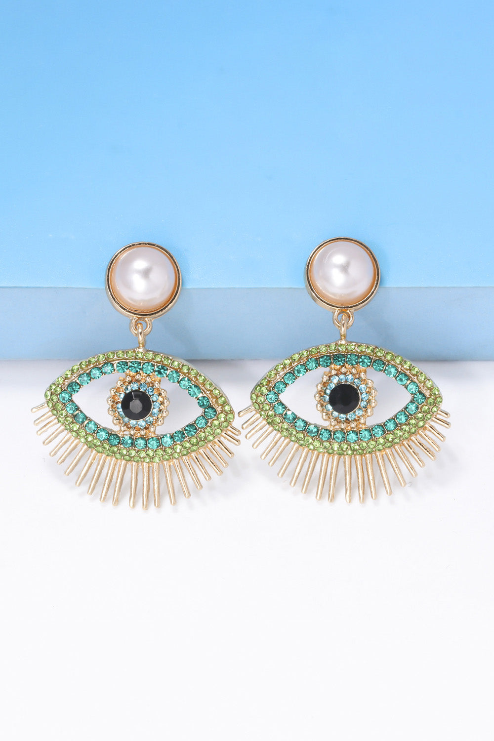 Green evil eye rhinestone dangle earrings