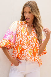 Colorful printed notched half sleeve blouse, front view