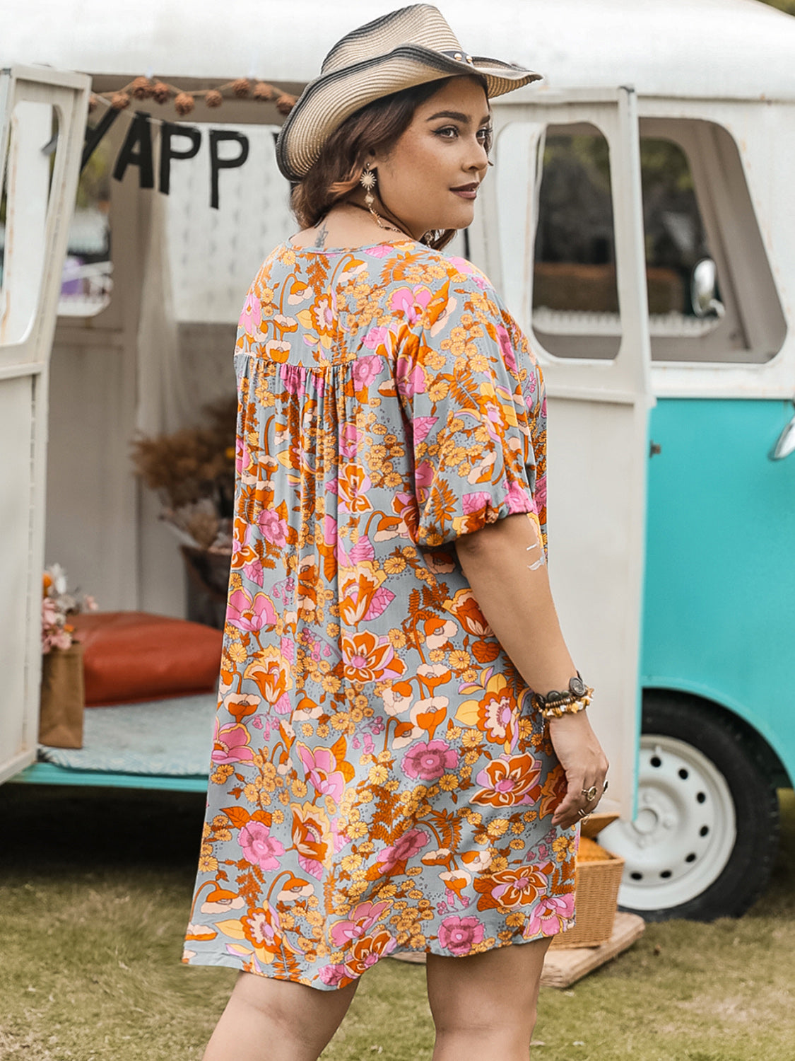 Plus size ruched printed mini dress with half sleeves, back view