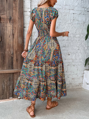 Back view of smocked paisley print midi dress