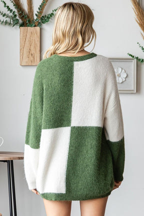 Back view of color block ribbed sweater in green and white