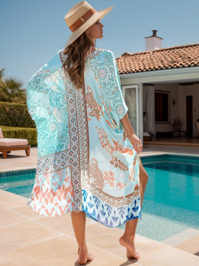 Back view of blue printed cover-up by the pool