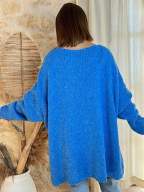 Back view of blue V-neck sweater