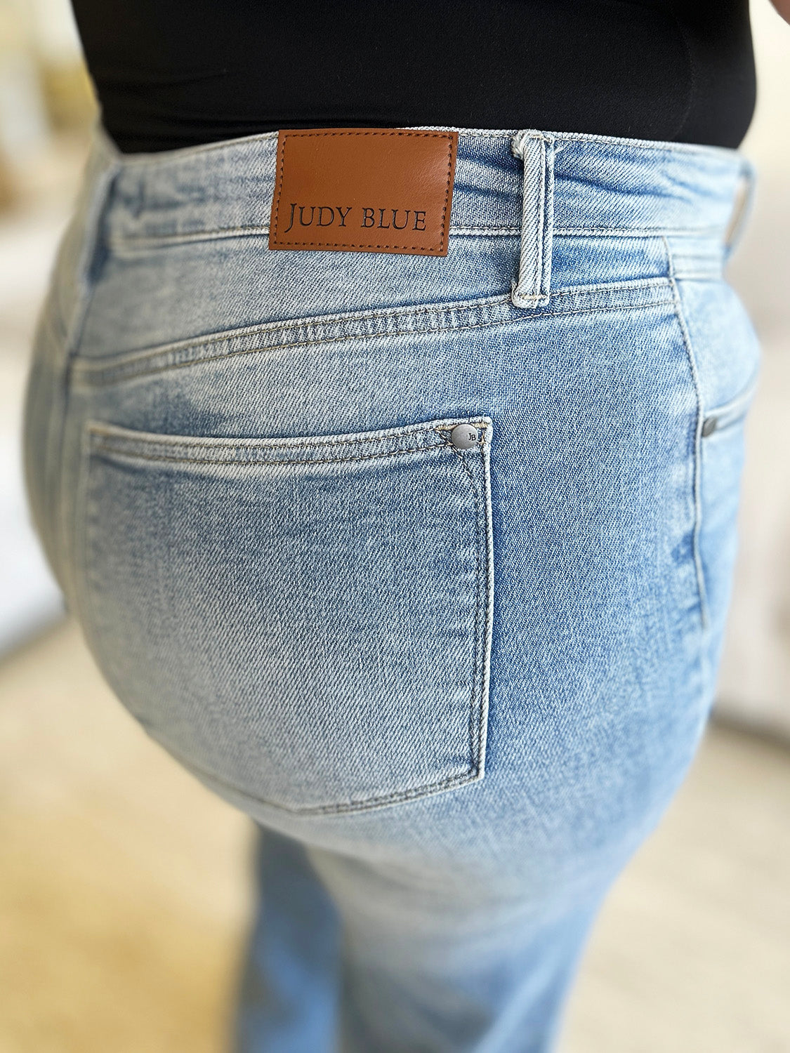 Close-up of Judy Blue jeans back pocket and label