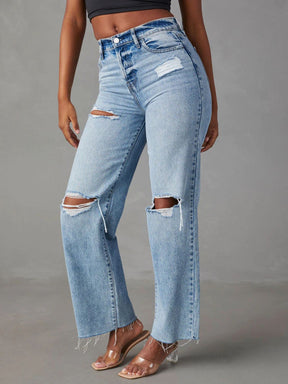 Distressed straight leg jeans with pockets, angled view