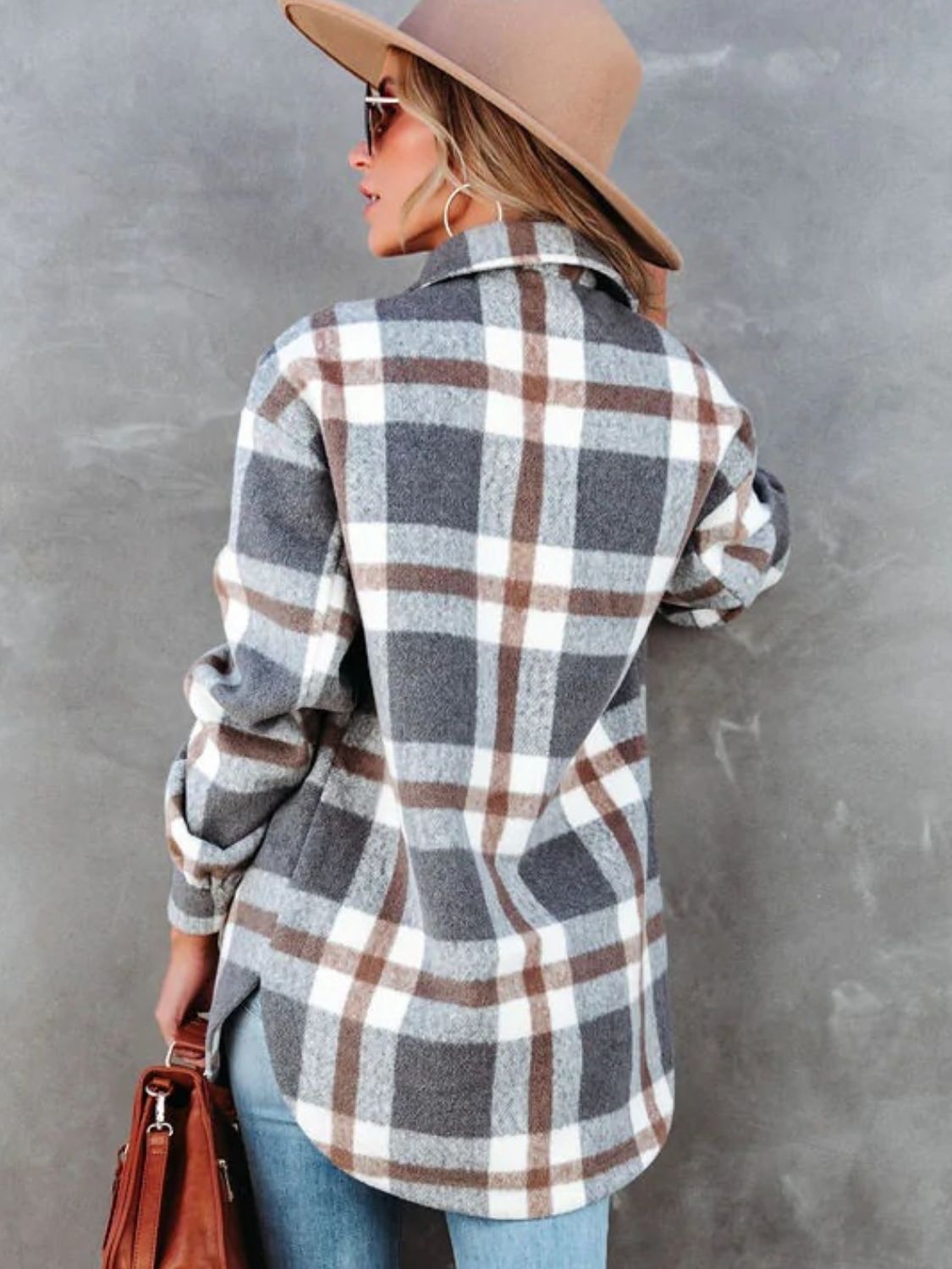 Back view of plaid collared neck long sleeve jacket.