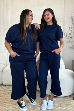 Navy short sleeve top and pants set, two models