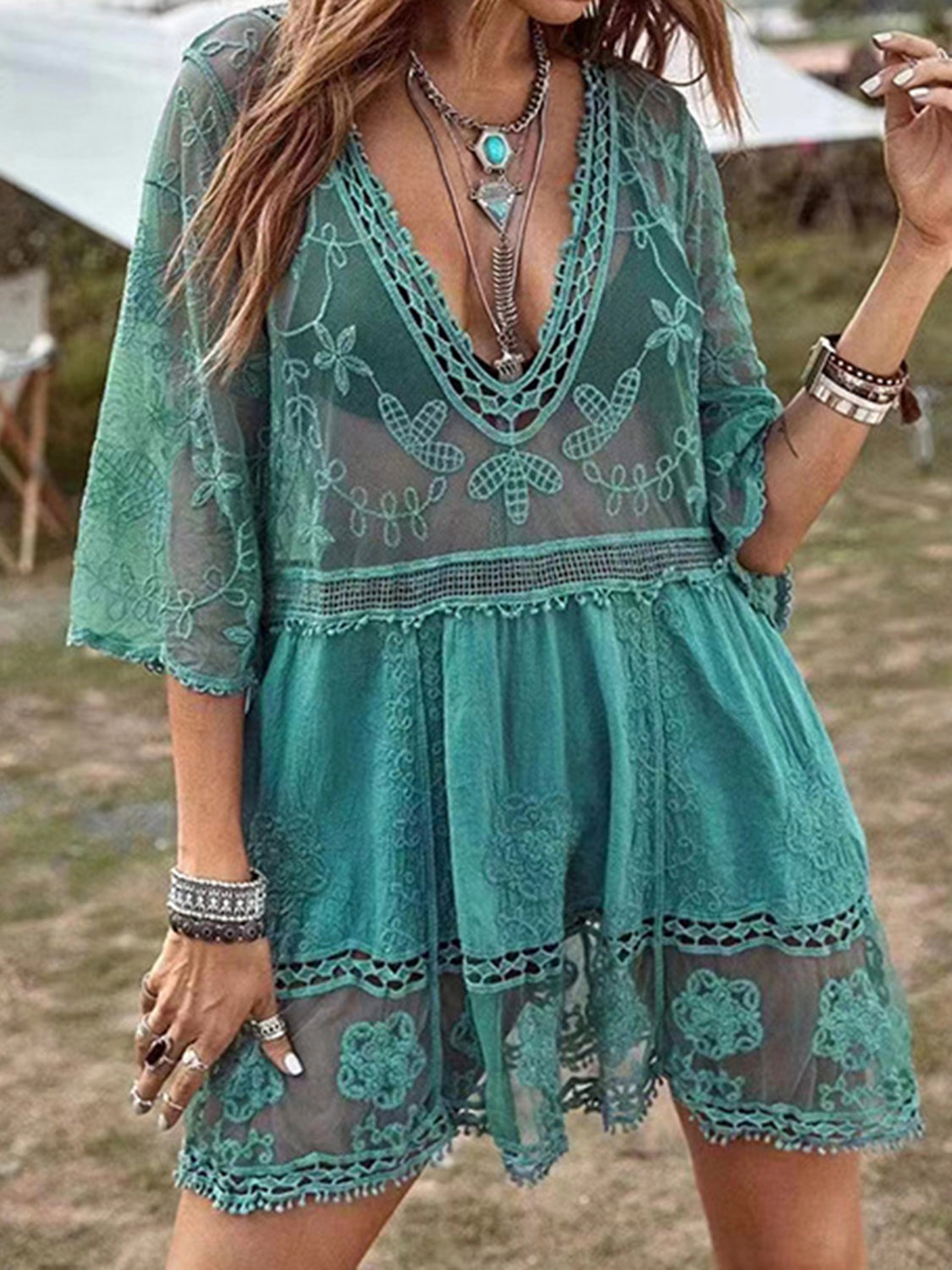 Teal lace detail plunge cover-up dress outdoors