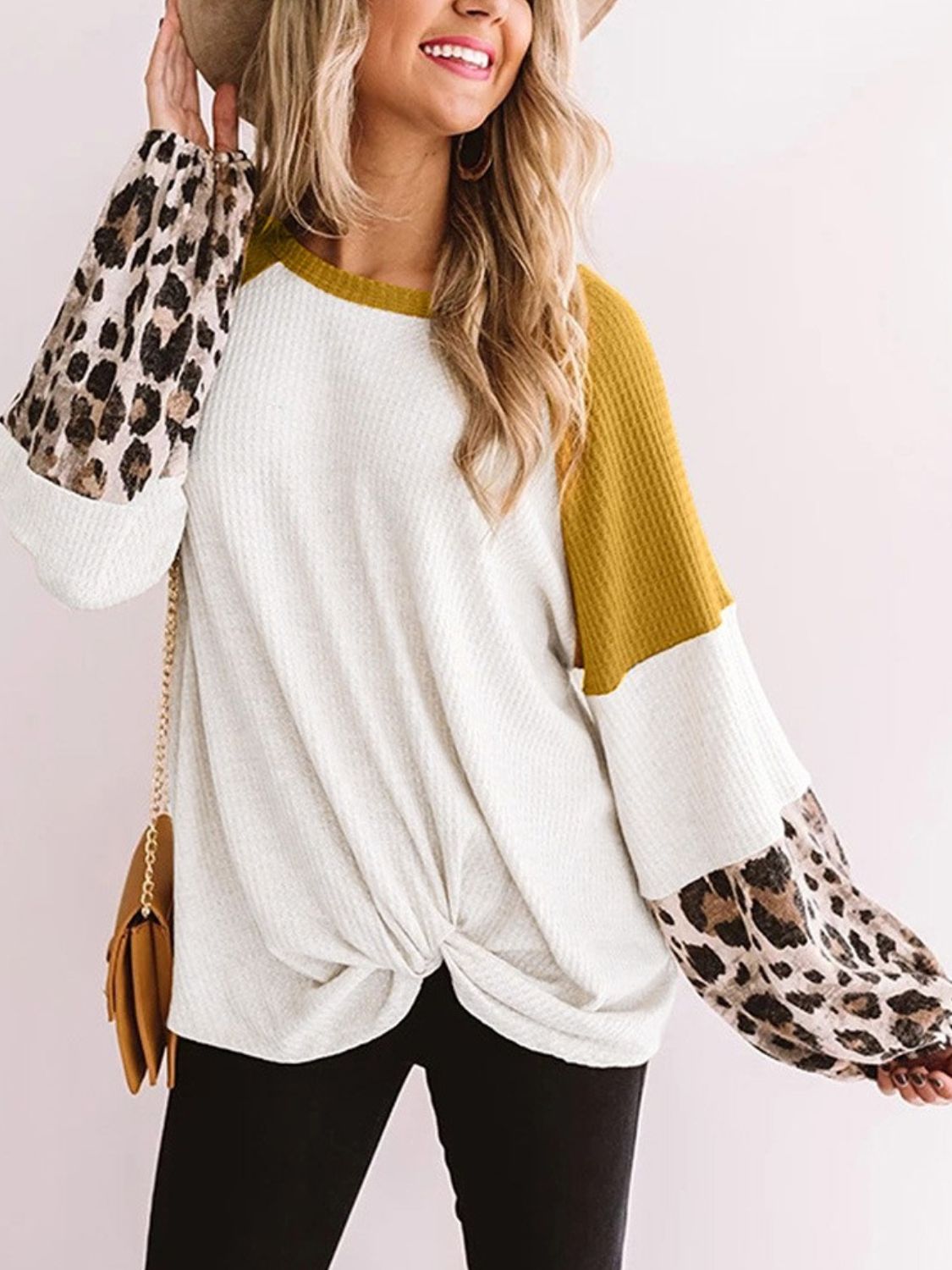 Twisted color block T-shirt with mustard and leopard print sleeves