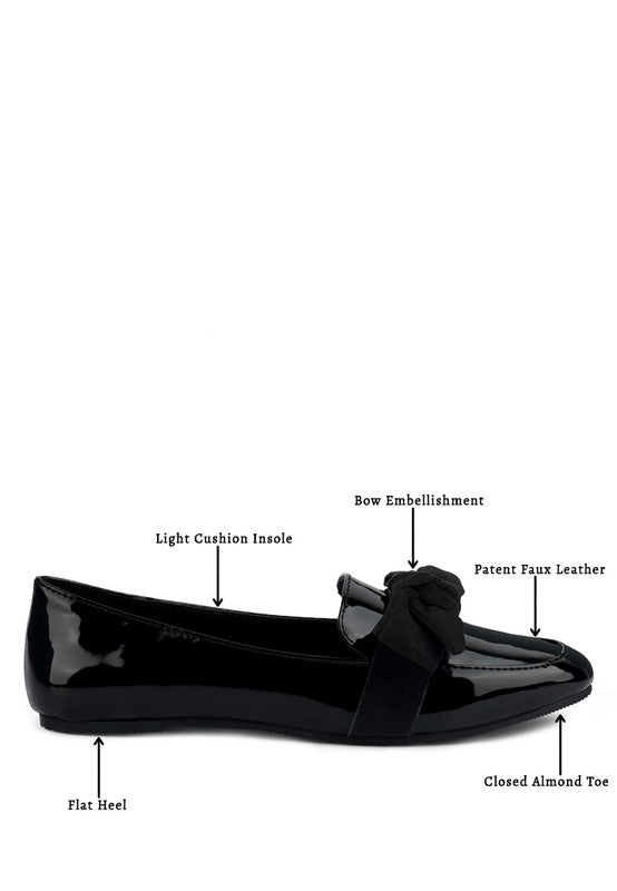 Black loafer with bow and labeled features