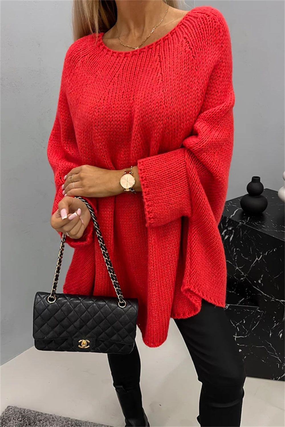 Red round neck batwing sleeve sweater, chic and cozy.