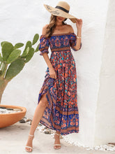 Floral flounce sleeve midi dress with slit, worn with sun hat.