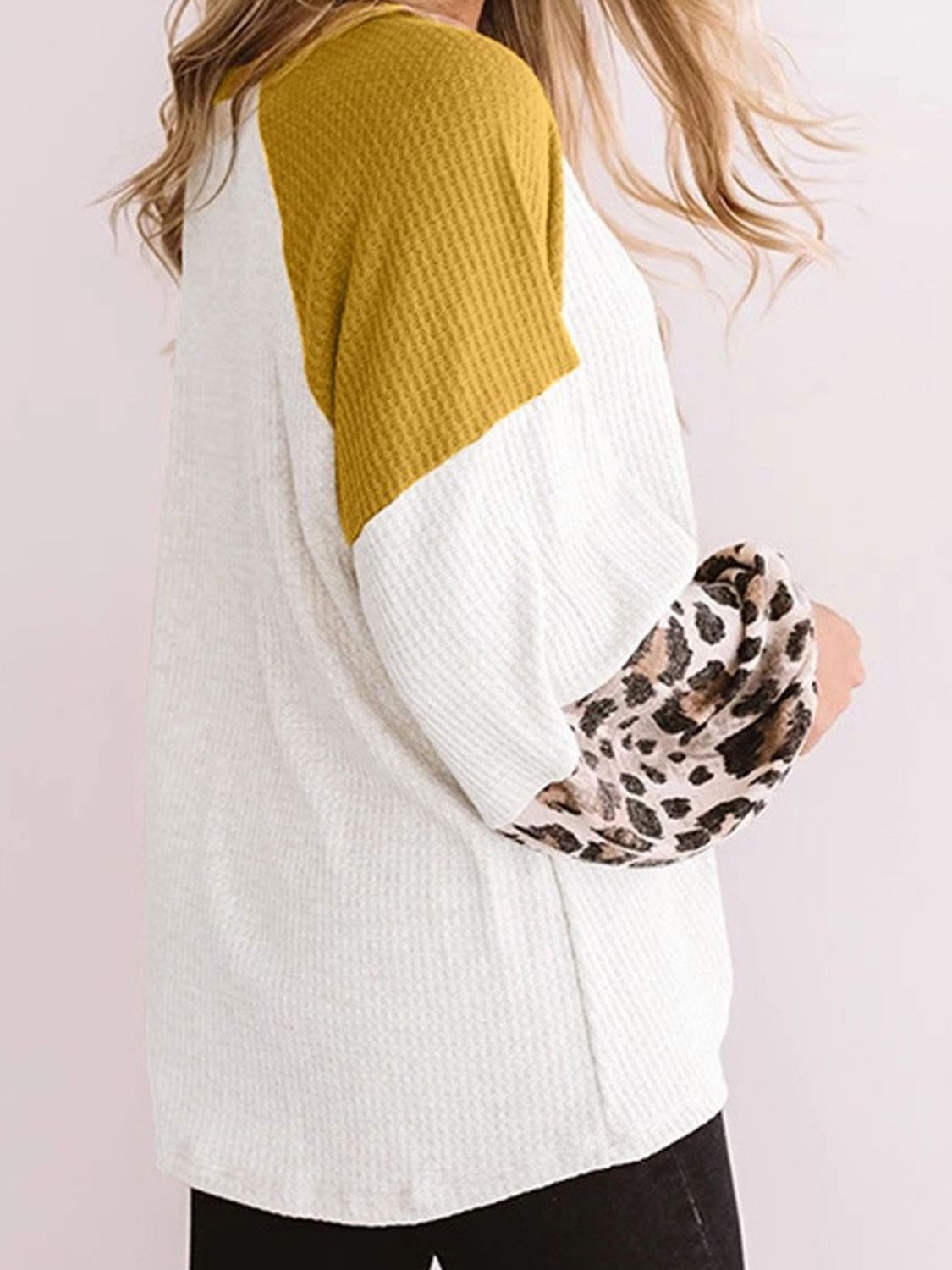 Back view of mustard color block T-shirt with leopard print sleeves