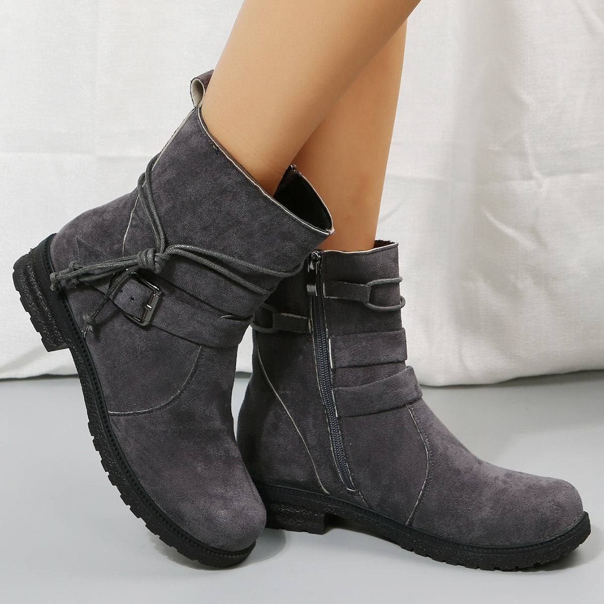 Dark gray suede side zip round toe boots with buckle detail