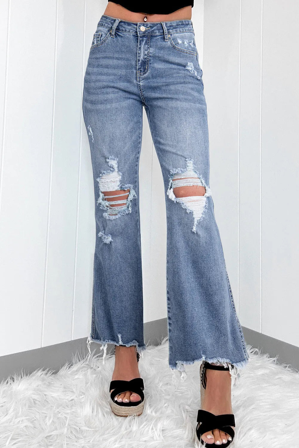 Distressed raw hem wide-cut jeans front view