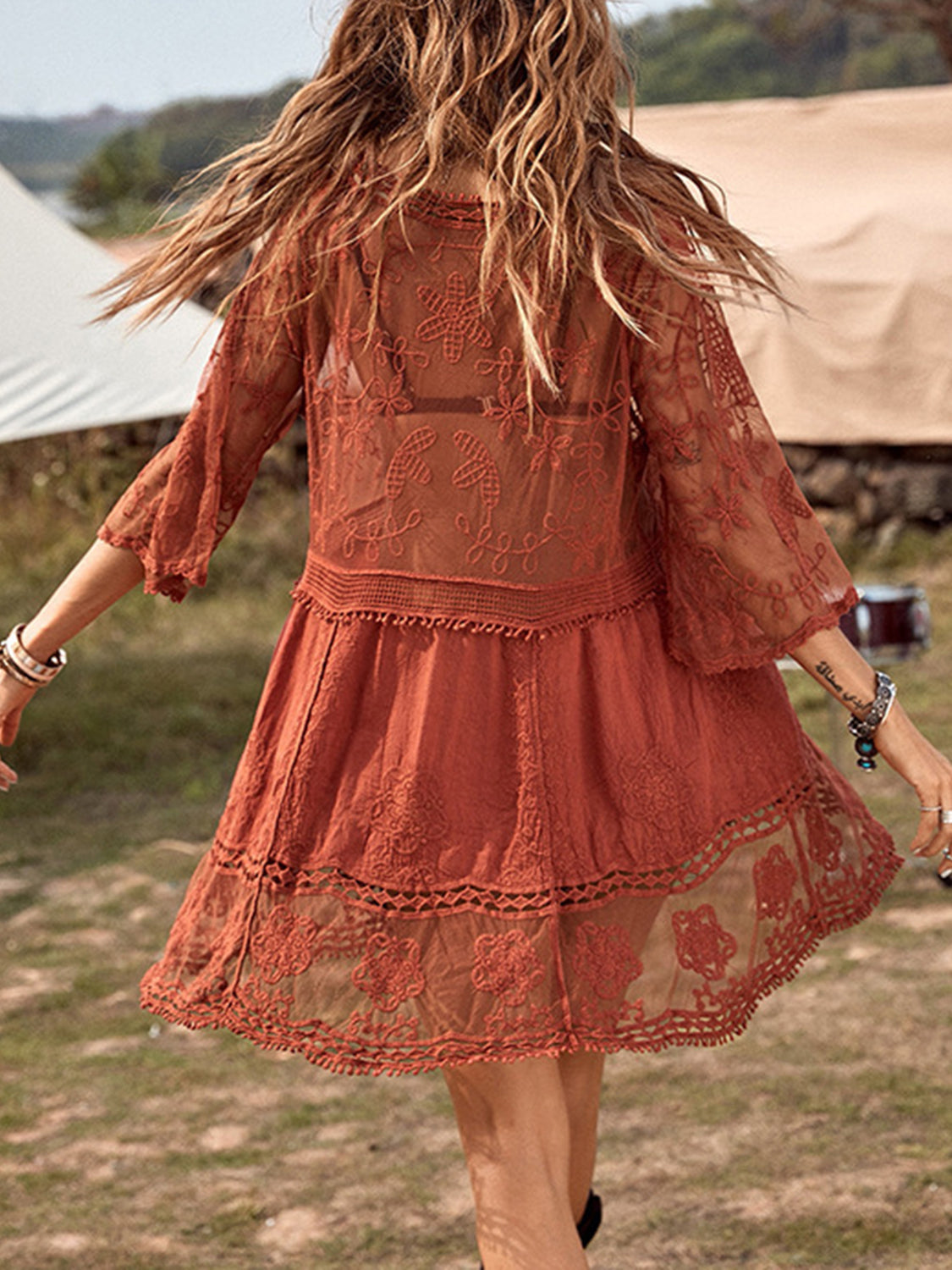 Back view of rust lace detail plunge cover-up dress