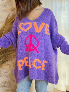 Purple V-neck sweater with peace graphic and love text