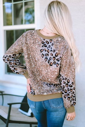 Leopard print long sleeve T-shirt with glitter accents, back view.