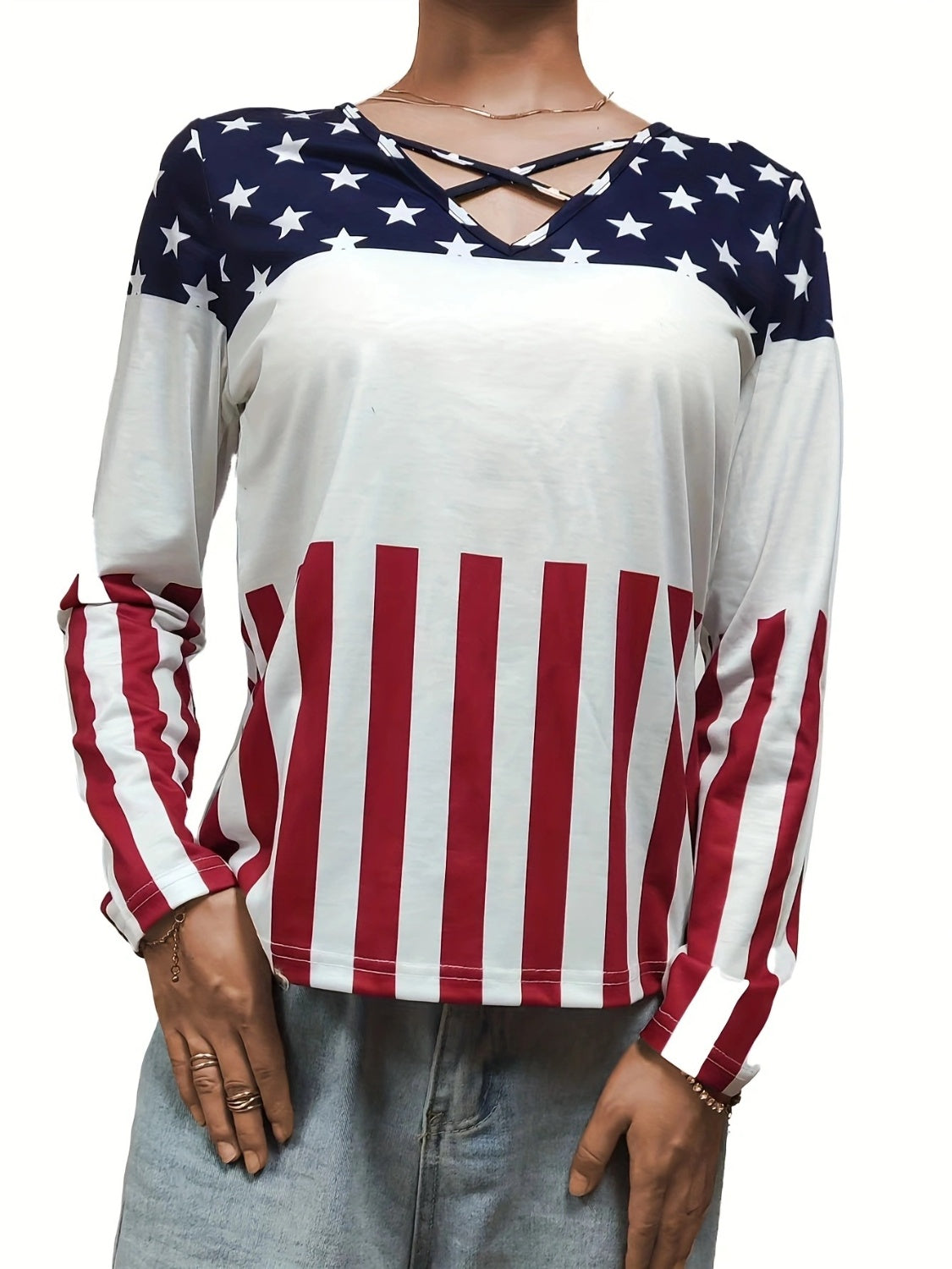 Front view of navy crisscross color block T-shirt with star and stripe pattern.