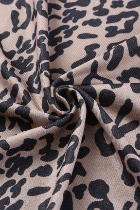 Close-up of leopard print fabric with black spots