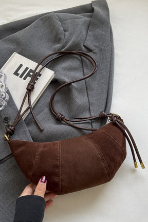 Brown suede shoulder bag with PU leather strap.