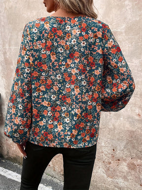 Floral printed V-neck blouse with balloon sleeves, back view