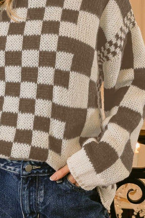 Close-up of checkered contrast chunky sweater pattern