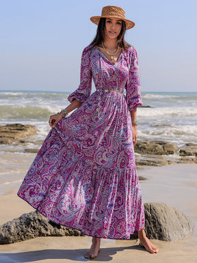 Printed tie neck balloon sleeve maxi dress on beach