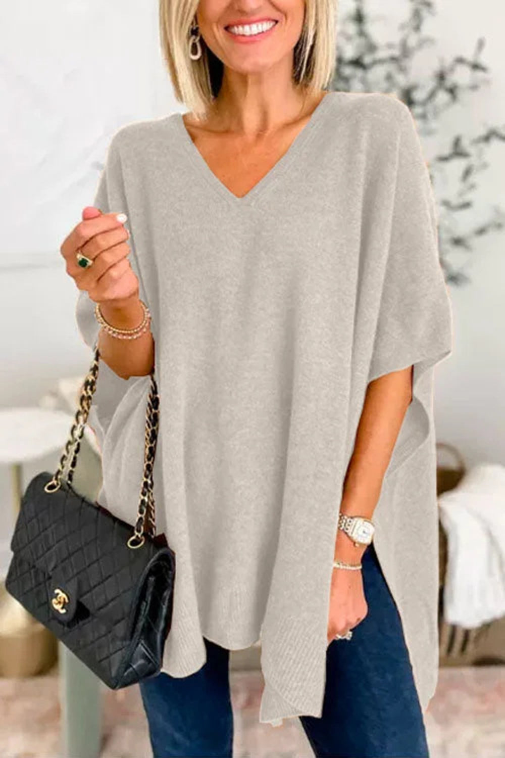 Light gray slit V-neck half sleeve knit top