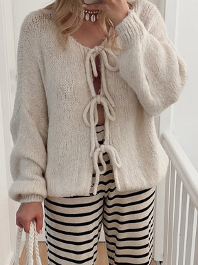 Beige tied long sleeve dropped shoulder cardigan