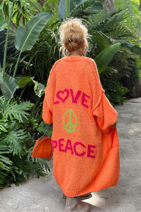 Orange long sleeve cardigan with love and peace design