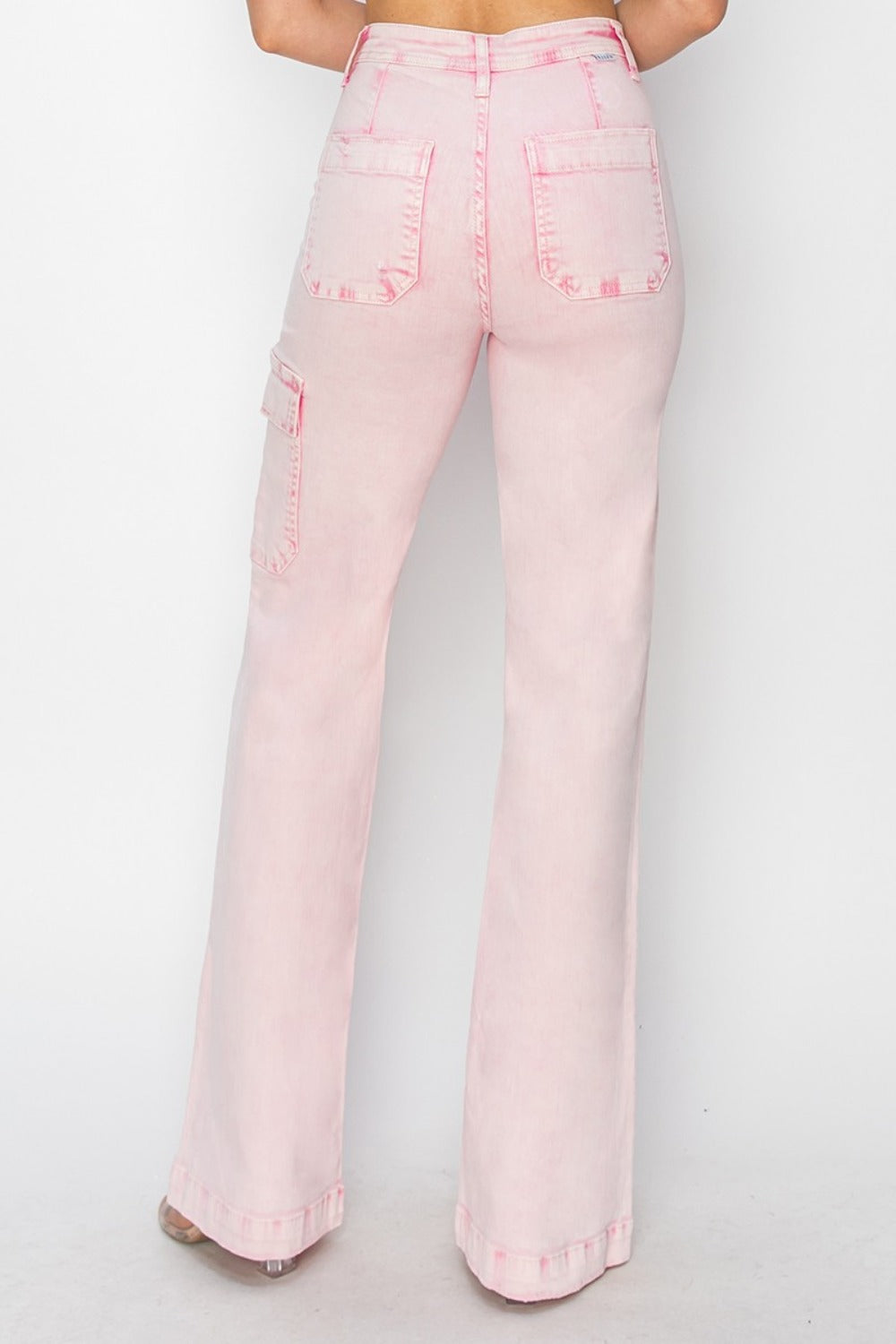 Back view of pink high rise wide leg cargo jeans