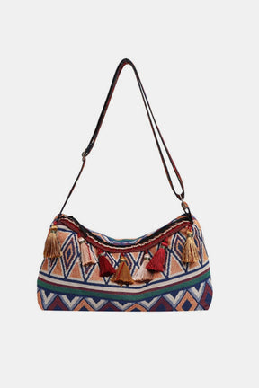 Geometric pattern shoulder bag with tassels and adjustable strap