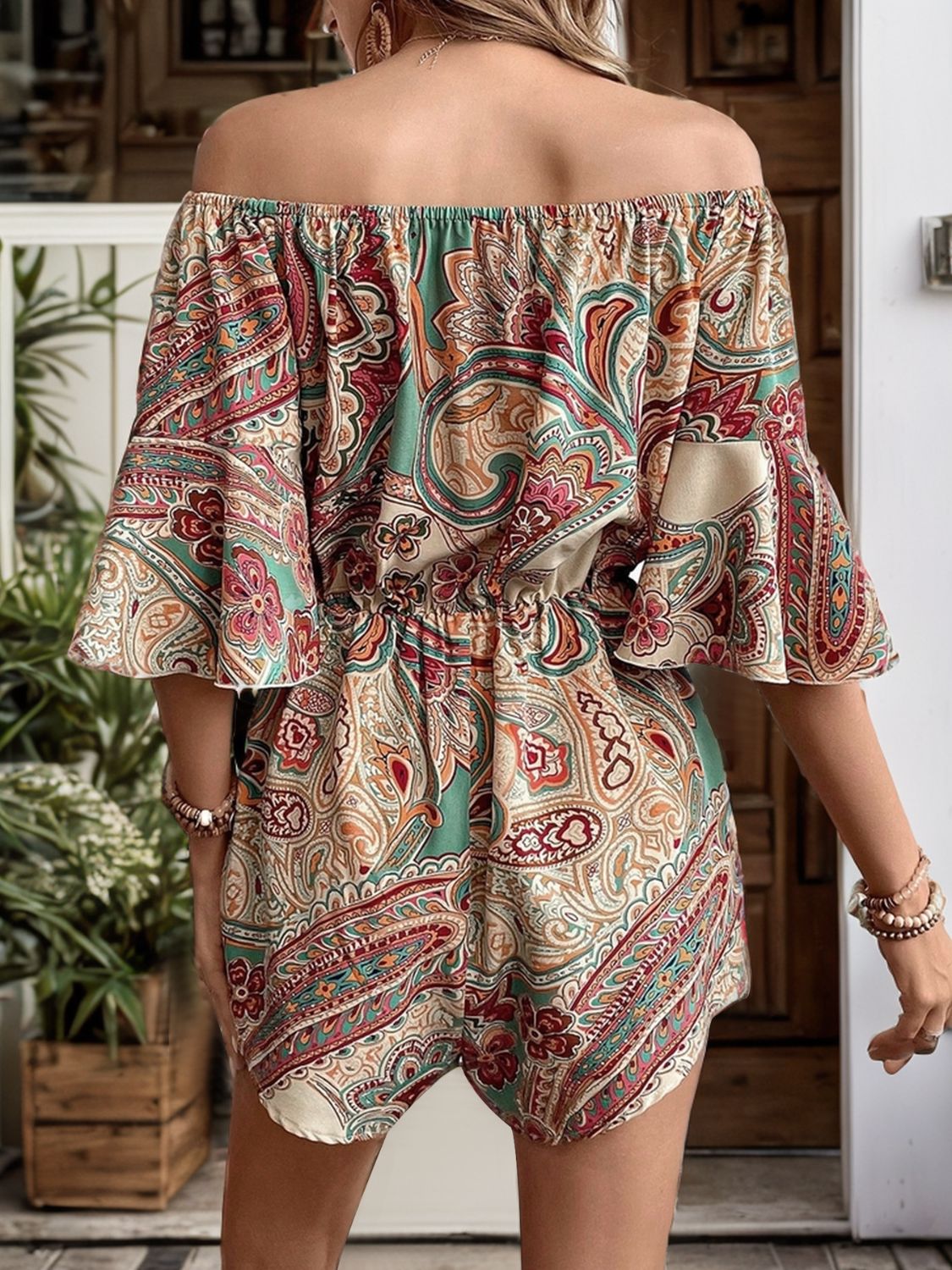 Printed off shoulder half sleeve romper, back view