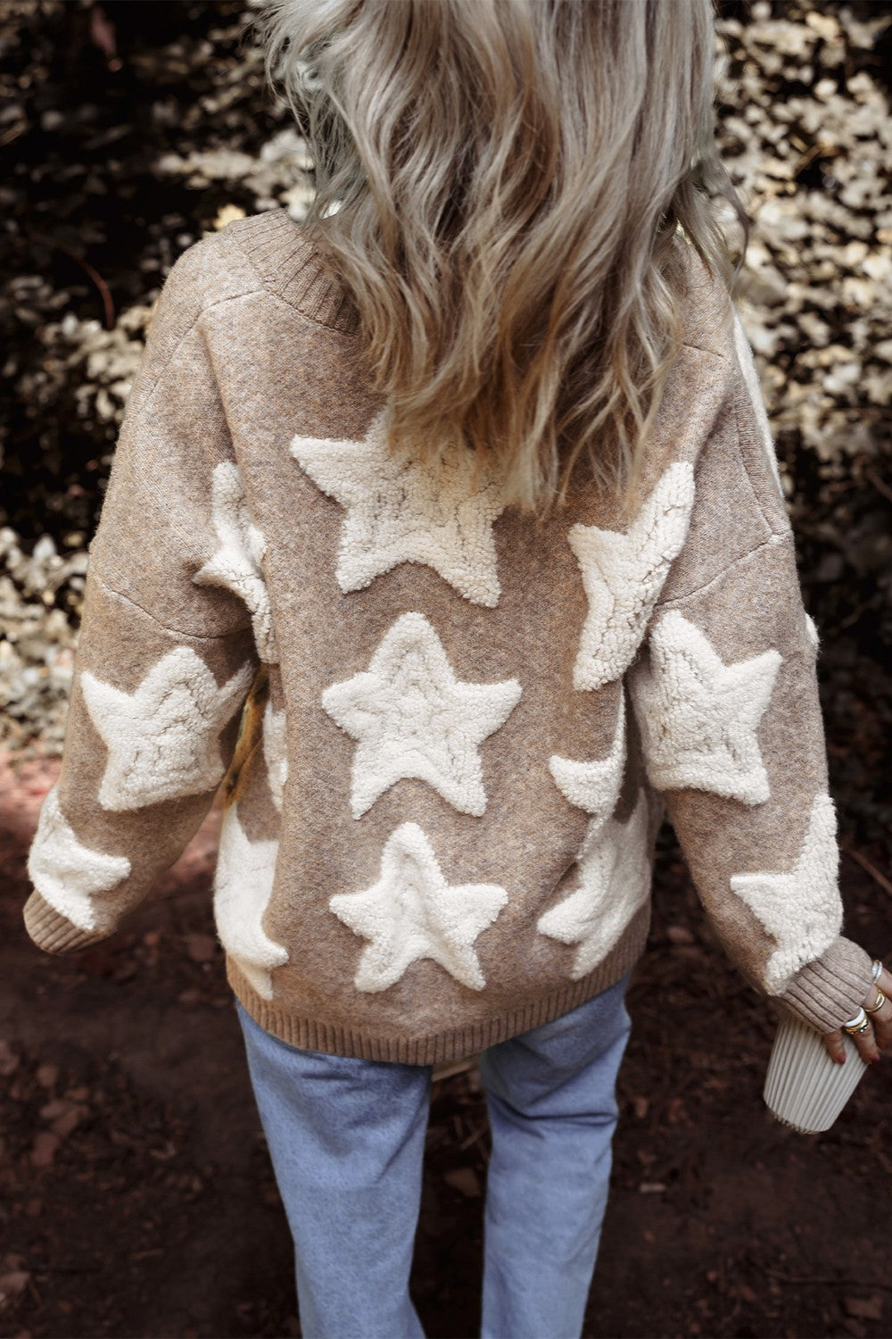 Back view of beige star button-up long sleeve cardigan